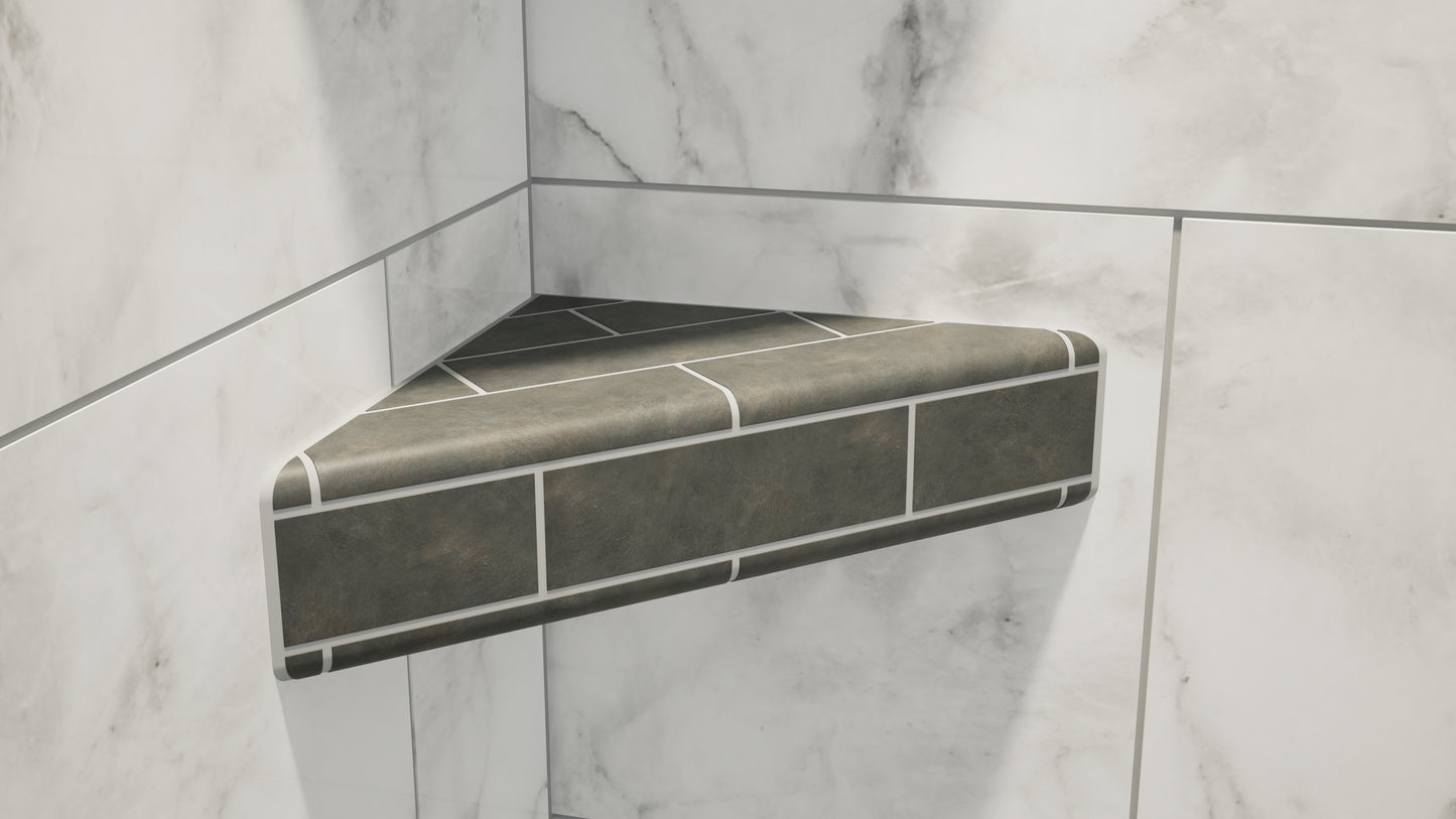 
                  
                    An original corner shower shelf with gray tile attached to a marbled shower wall.
                  
                