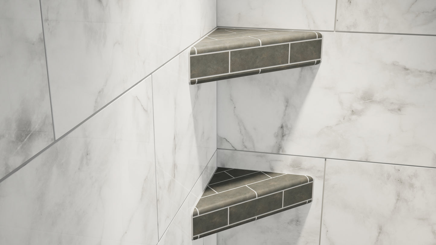 
                  
                    Two original corner shower shelves covered in gray tile attached to a marble bathroom wall.
                  
                