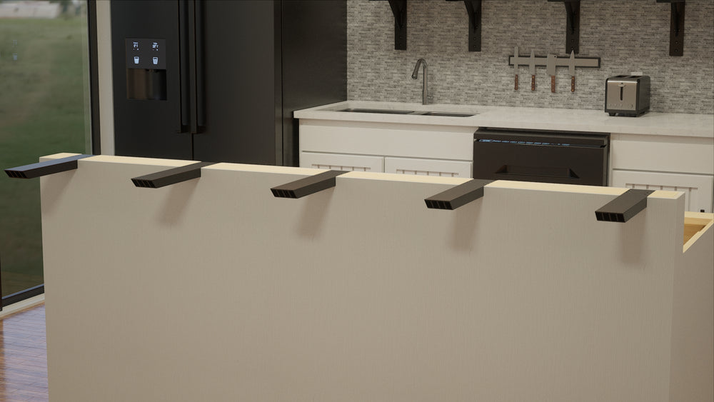 
                  
                    5 black Industrial L Countertop Support Brackets affixed to a beige island with a black refrigerator and a white countertop in the background.
                  
                