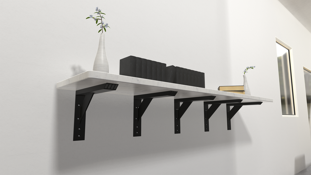 A white marble shelf with 2 flower vases and several books held in place by 5 black Industrial Large Shelf Brackets against a white wall.