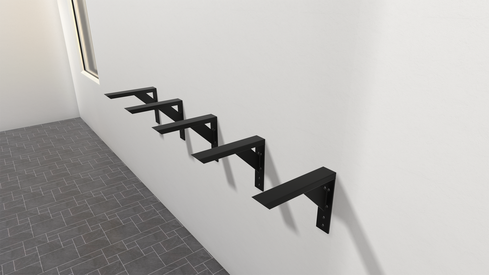 
                  
                    5 Industrial Large Shelf Brackets attached to a white wall with a gray tile floor.
                  
                